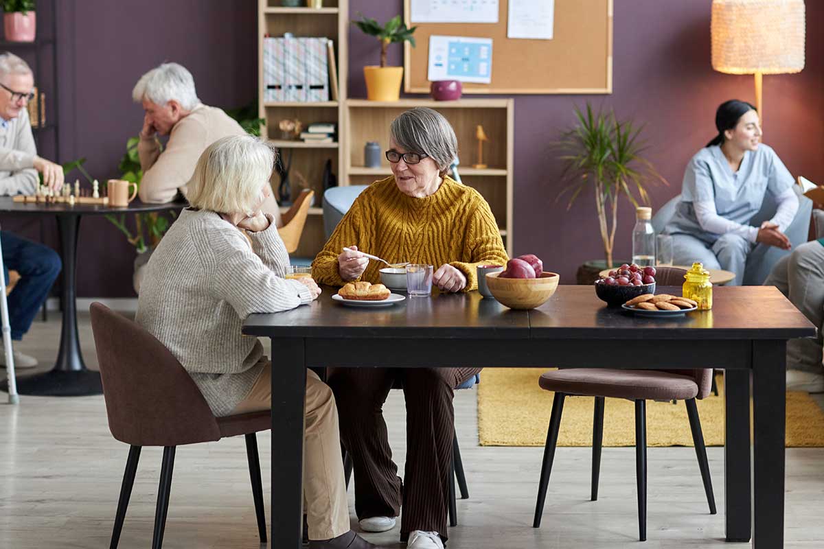 A group of seniors in a long-term care facility.